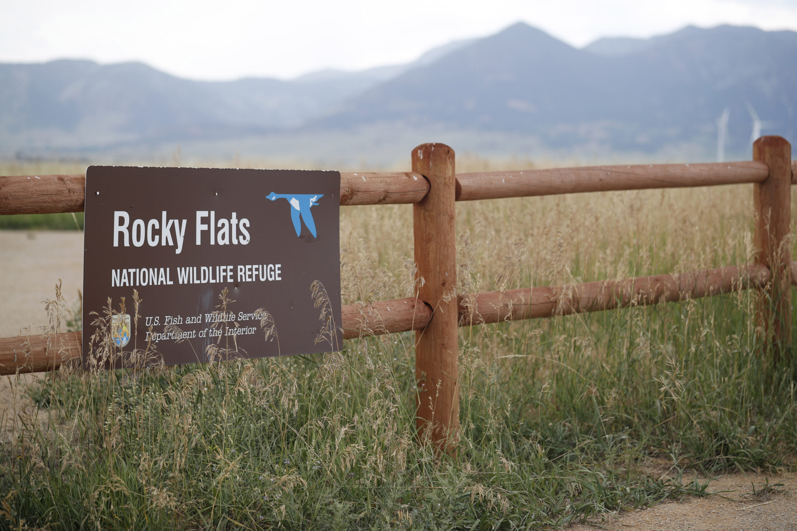 Sign on fence designating Rocky Flats National Wildlife Refuge